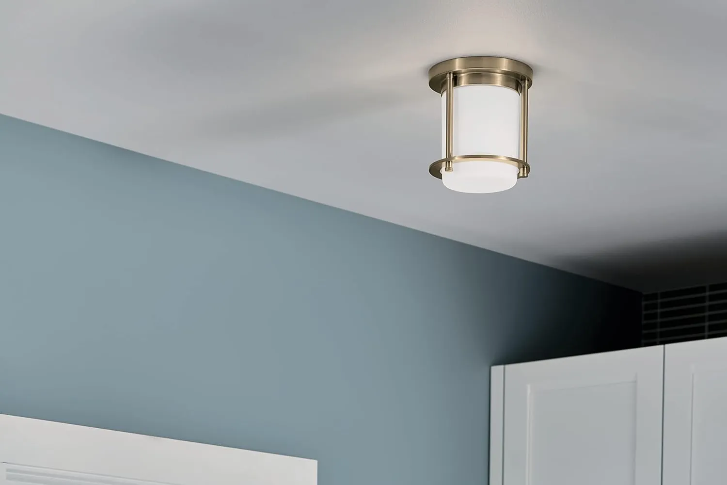 Kichler Brit 52596CPZ Flush Mount 1-Light 7.25˝ with Satin Etched Cased Opal Glass in Champagne Bronze